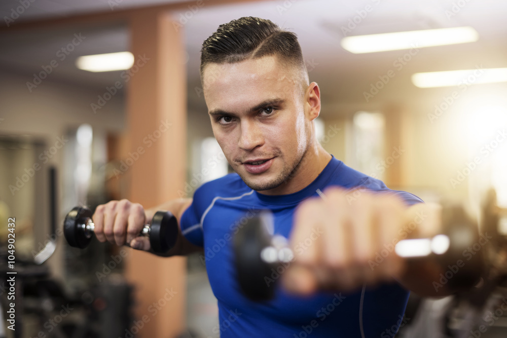Fototapeta premium Strong and handsome man at the gym