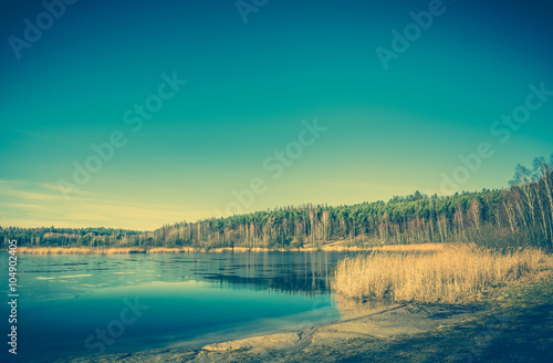 Vintage photo of lake landscape.