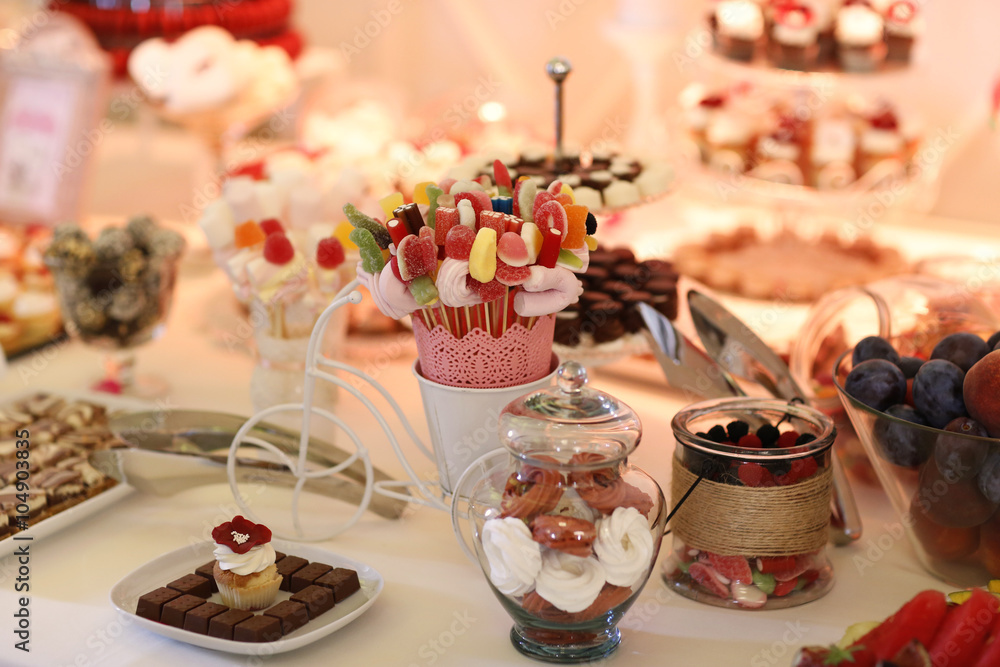Delicious sweets on candy buffet