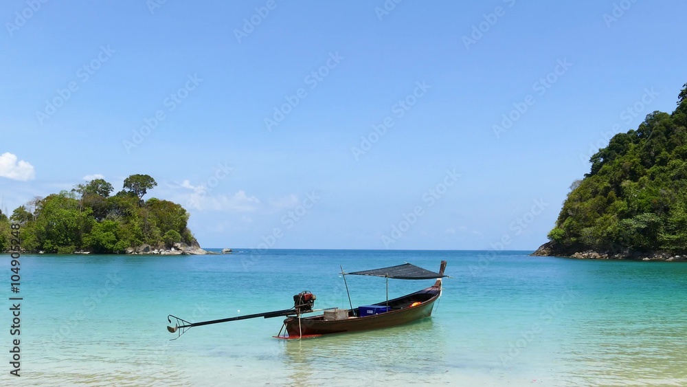 Long tail boat and tropical beach on Gulf of Thailand. Long tail boat and tropical beach on Gulf of Thailand.