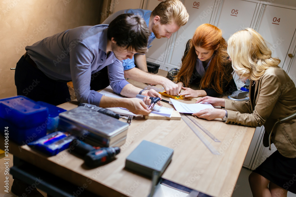 Group of creative designers brainstorming Group of creative designers brainstorming