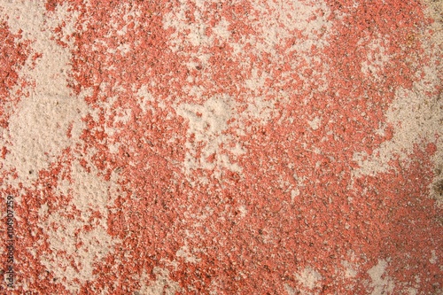 Red running track texture foe, sand on ground, detail