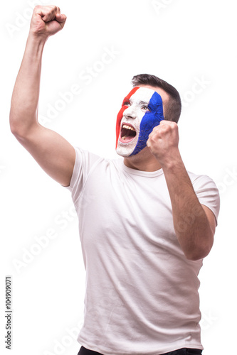 Euphoric scream of France football fan in win game of France national team. Big smile, scream, Hands over head on white background. UEFA EURO 2016 football fans concept.