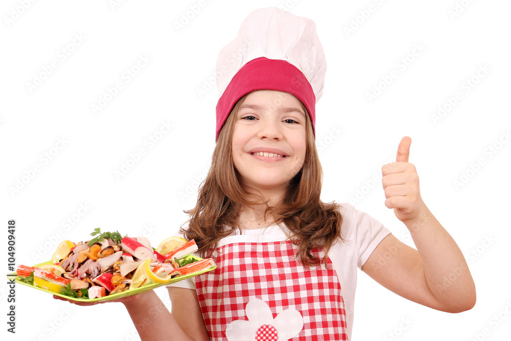 happy little girl cook with seafood and thumb up happy little girl cook with seafood and thumb up