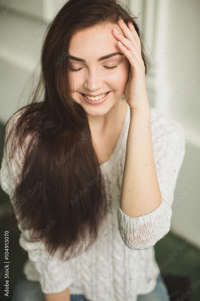 Portrait of a young lady in photostudio interior Portrait of a young lady in photostudio interior