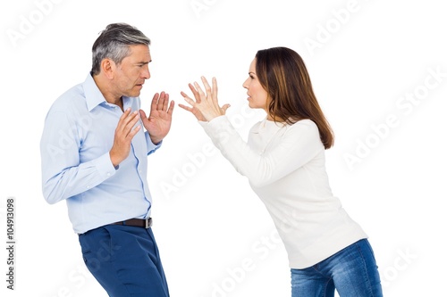Annoyed woman yelling at husband