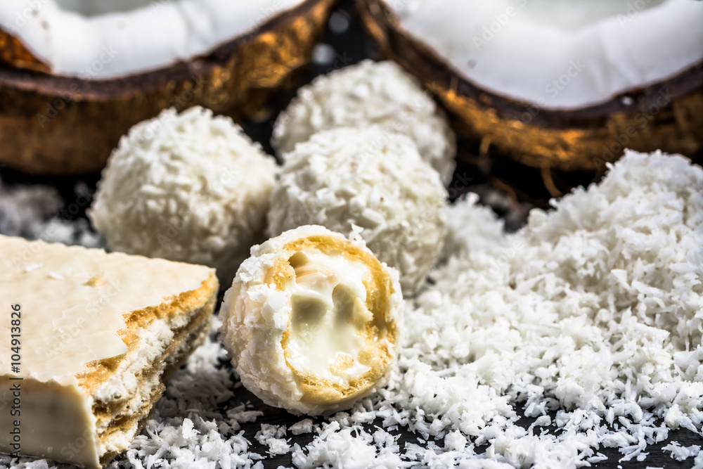 Coconut balls in coconut flakes and coconut wafer Coconut balls in coconut flakes and coconut wafer