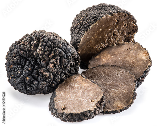 Black truffles isolated on a white background.