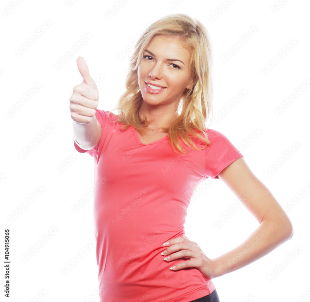 happy fitness woman showing thumb up happy fitness woman showing thumb up