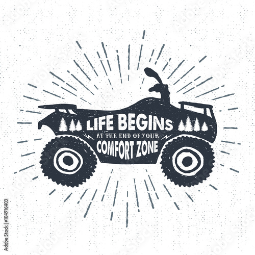 Hand drawn textured label with quad bike vector illustration and "Life begins at the end of your comfort zone" inspirational lettering.