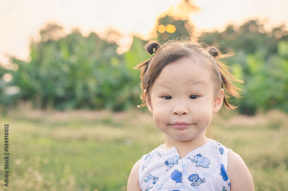 Little asian girl playing outdoor Little asian girl playing outdoor