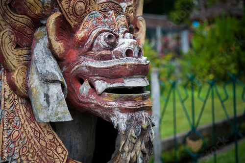 traditional Balinese God statue in Central Bali temple. Indonesia