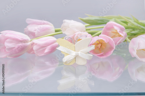 Pink tulips and butterfly decoration 