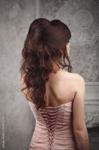 Studio shoot of beautiful bride's hairstyle. Brunette.