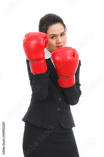 Asian business woman with boxing gloves isolated on white backgr