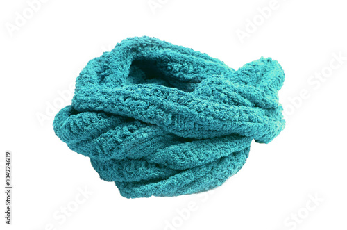Warm knitted green scarf isolated on white background