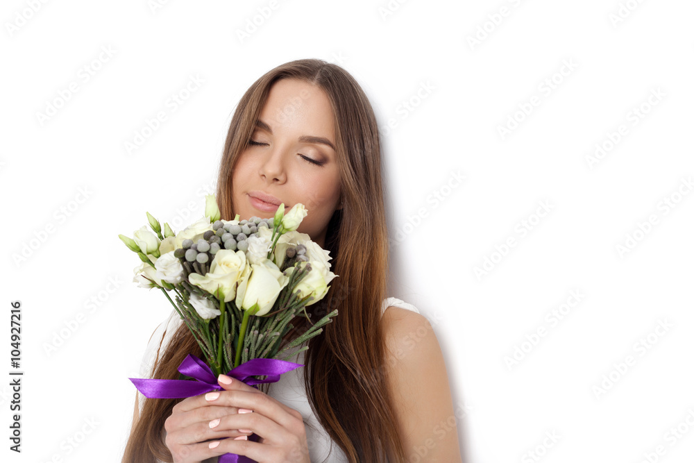 Young cute woman holding bunch of flowers Young cute woman holding bunch of flowers