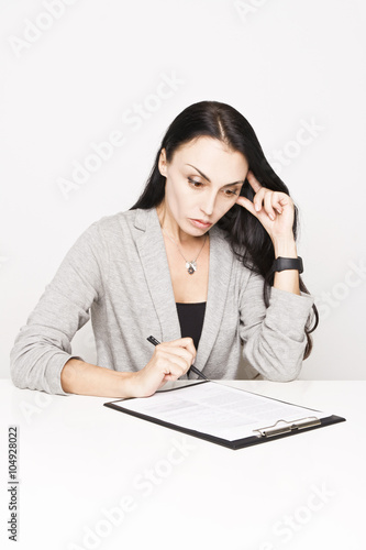 Portrait of a business woman with binder