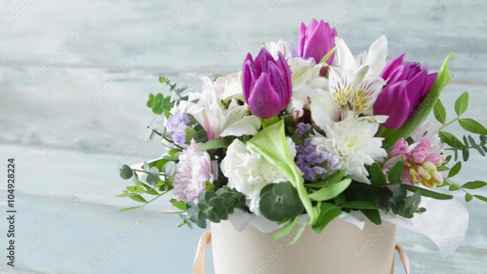 This video is about beautiful basket of flowers stylish bouquet spring tone wood background This video is about beautiful basket of flowers stylish bouquet spring tone wood background