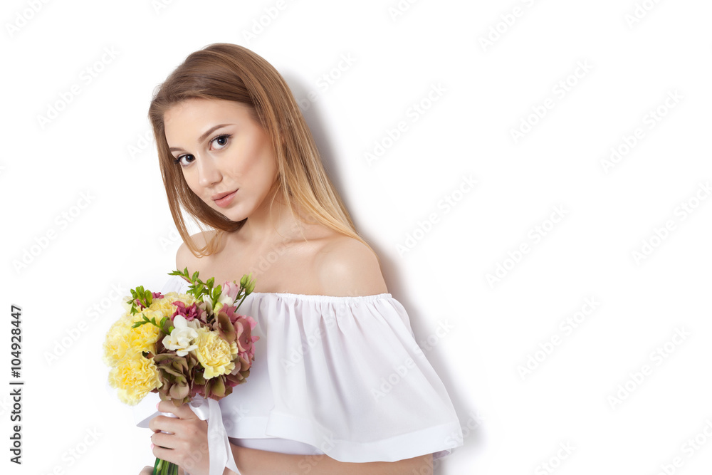 Young cute woman with spring flower bouquet Young cute woman with spring flower bouquet