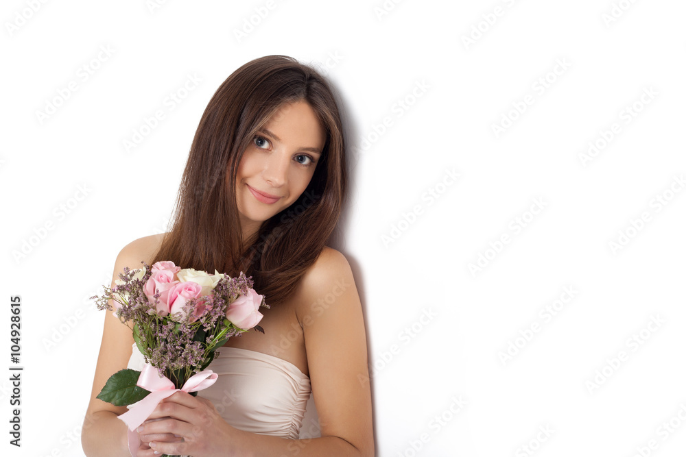 Young cute woman holding bunch of flowers