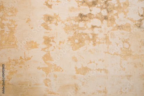Aged grunge dirty tan brown concrete texture wall background