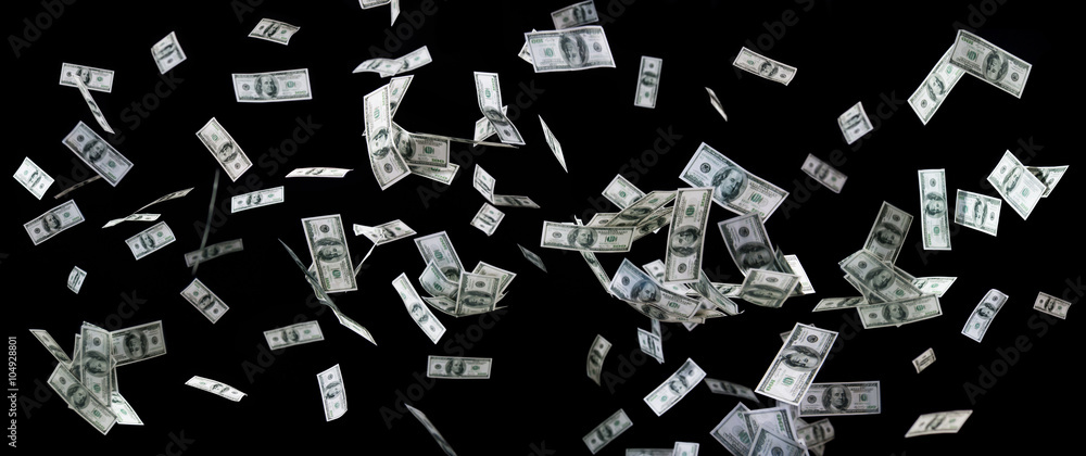 close up of us dollar money flying over black - obrazy, fototapety, plakaty 