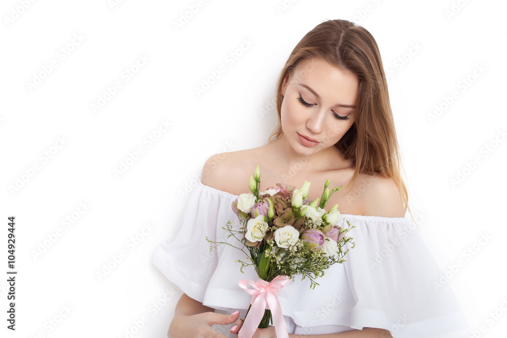 Young cute woman holding bunch of flowers Young cute woman holding bunch of flowers
