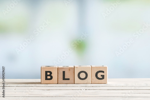 Blog sign on a wooden table