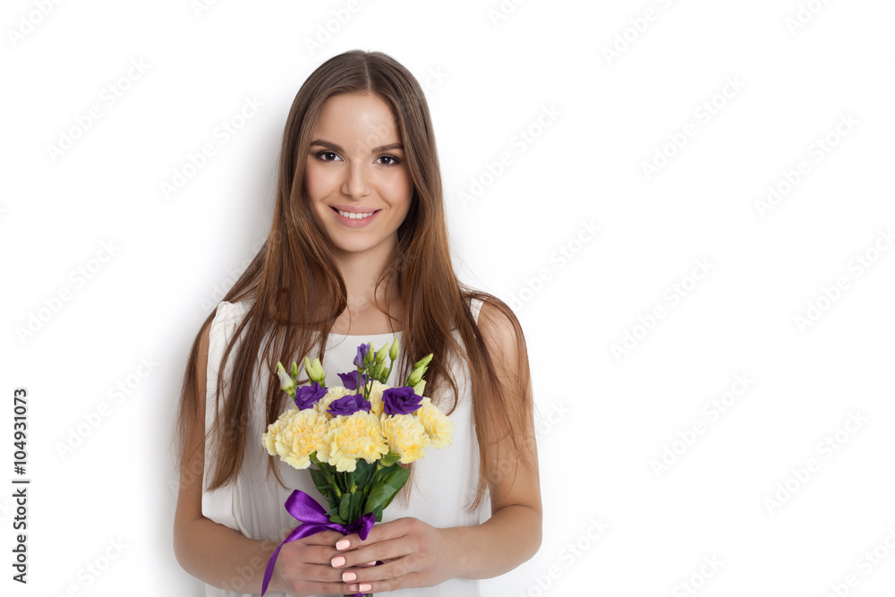 Young cute woman with spring flower bouquet