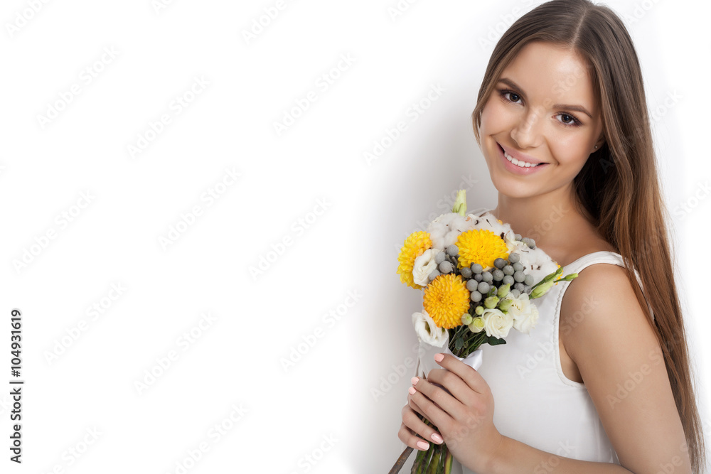 Young cute woman with spring flower bouquet Young cute woman with spring flower bouquet