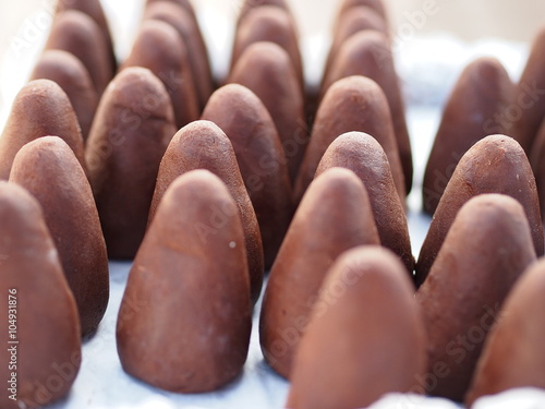 The Spire (Spicka) - Group of traditional czech chocolate dessert (filled with eggnog) photo