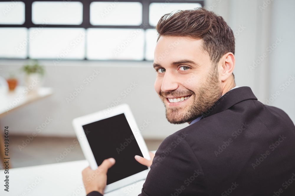 Portrait of happy businessman using digital tablet Portrait of happy businessman using digital tablet