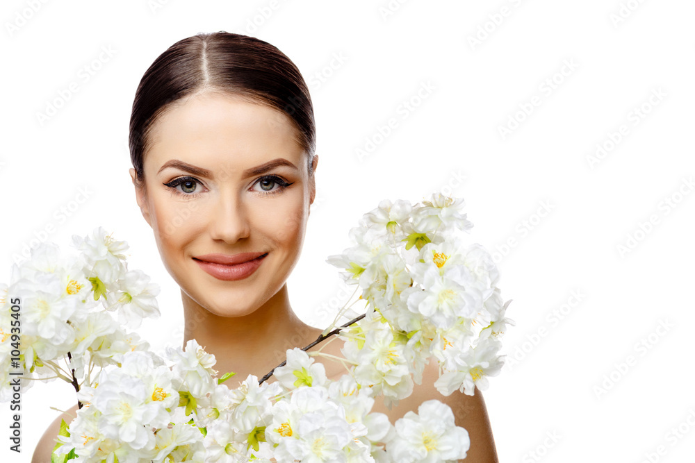 Beautiful Woman with Clean Fresh Skin holding flowering branches Beautiful Woman with Clean Fresh Skin holding flowering branches