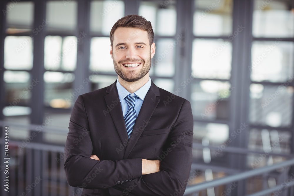 Happy businessman with arms crossed Happy businessman with arms crossed