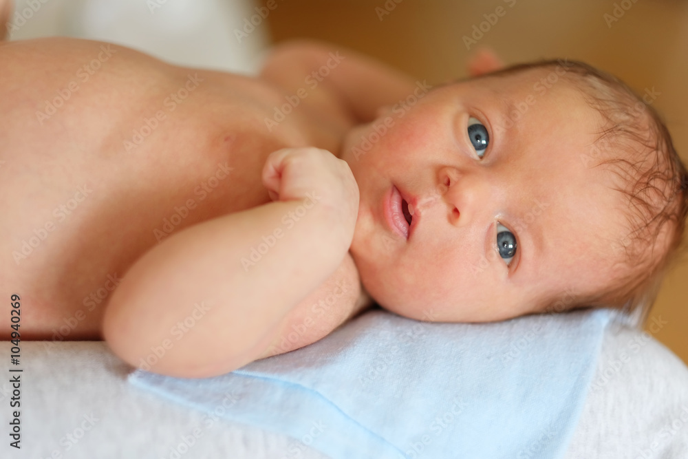 One month old newborn baby with mother One month old newborn baby with mother