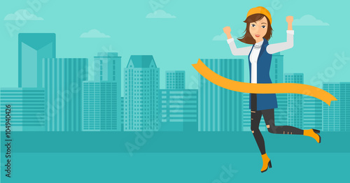 Business woman crossing finish line.
