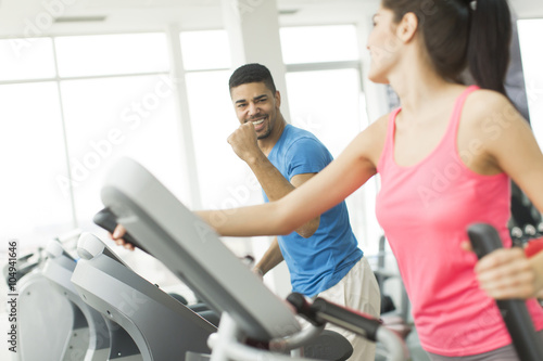 Young multiracial people training in the gym
