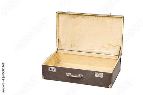Opened vintage suitcase on white