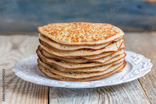 Stack of pancakes from wholegrain flour.
