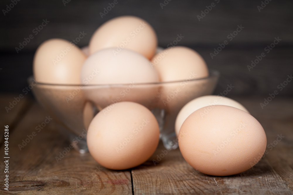 Chicken fresh brown eggs on wooden rustic table Chicken fresh brown eggs on wooden rustic table