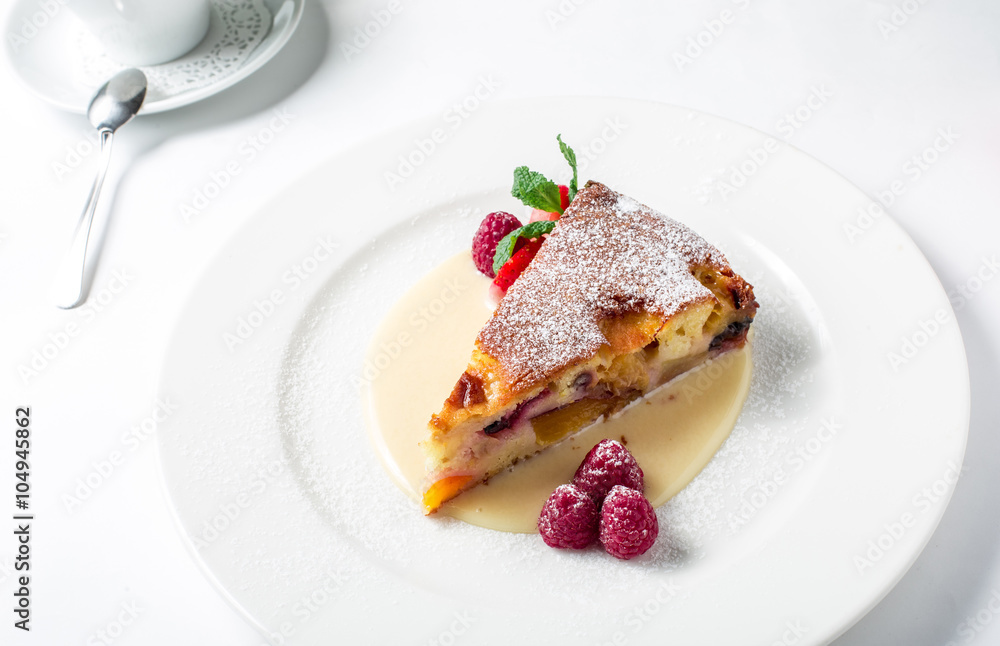Piece of delicious clafoutis with nectarine and plum Piece of delicious clafoutis with nectarine and plum