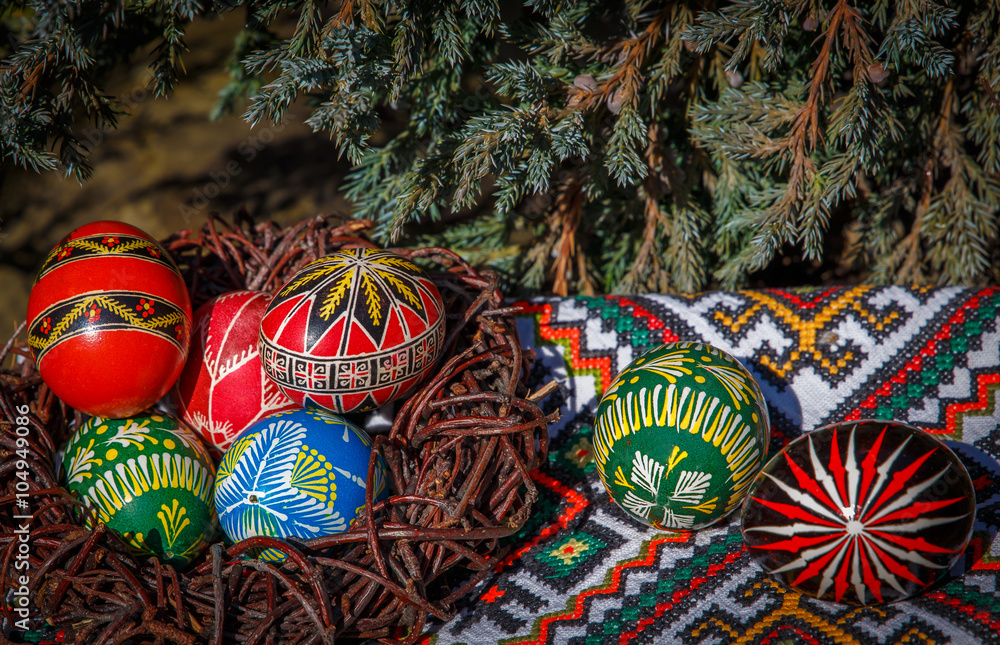 Easter eggs on a embroidered towel. easter background