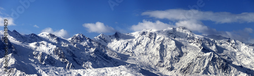 Panoramic view on snowy mountains in nice sunny day © BSANI