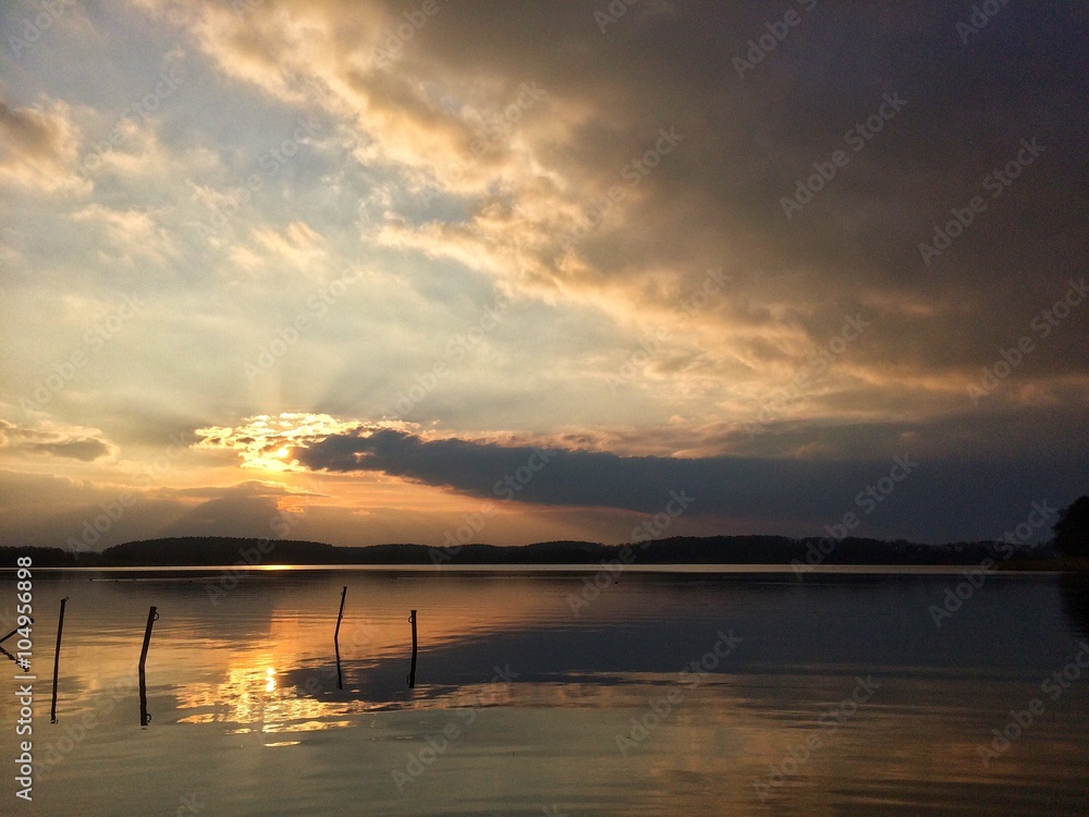Beatiful sunset over lake, tranquil landscape