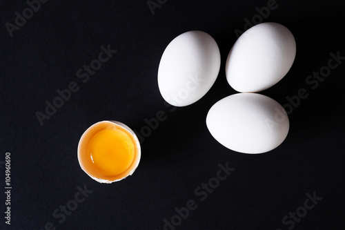 Several eggs on a black background