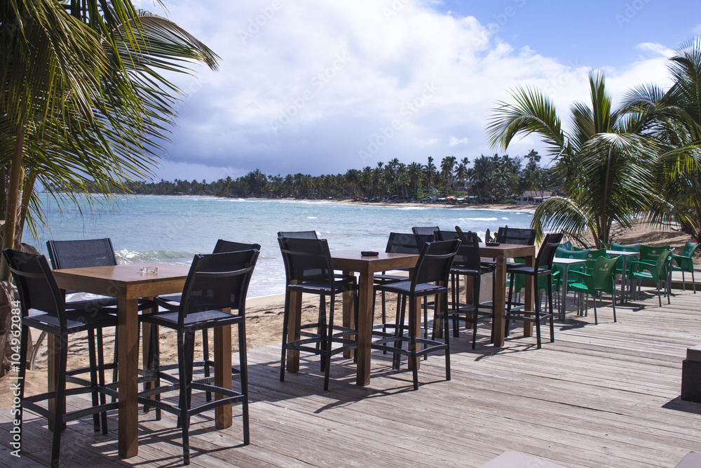 Chairs and tables at a beach restaurant