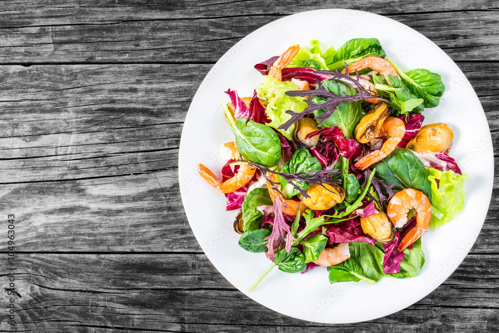 salad of prawns, mussels, lettuce leaves, spinach, arugula, radi salad of prawns, mussels, lettuce leaves, spinach, arugula, radi