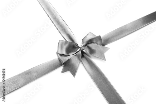 Silver silk ribbon with beautiful bow isolated on white background