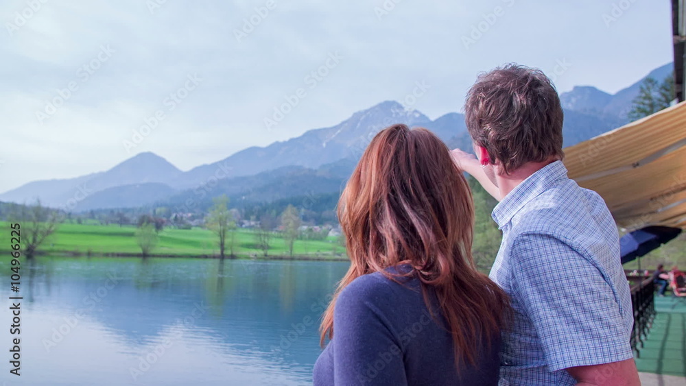 Couple looking at the mountains Couple looking at the mountains